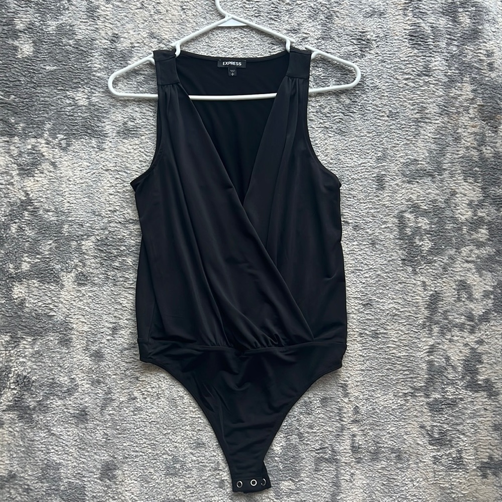 Never worn cross front bodysuit